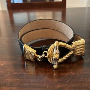 Belt, black leather with gold & silver buckle. Size 32”